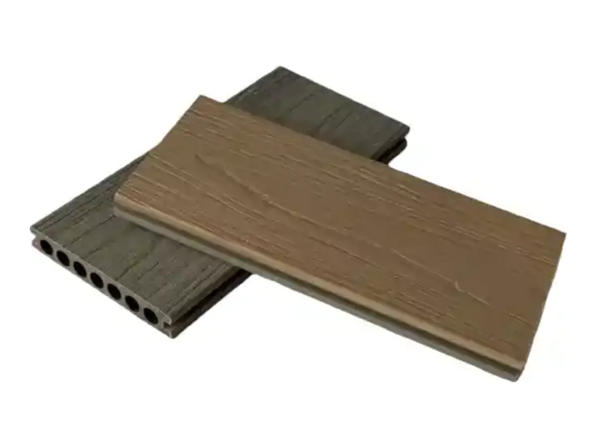Dual-color composite decking boards in two wood tones